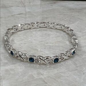Elegant Silver Bracelet with Blue Accents